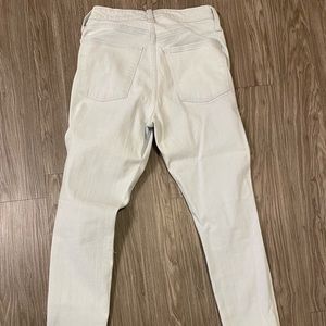 Never worn light wash jeans.